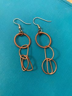 Copper chain link earrings Modern Metal Earrings With Hook Style, Modern Metal Earrings With Hooks And Links, Modern Link Earrings With Hooks, Modern Dangle Earrings With Hook And Links, Single Chain Link Earring In Metal, Modern Oval Link Chain Earrings, Modern Link Shaped Metal Earrings, Modern Link Chain Earrings, Metal Link Chain Earrings