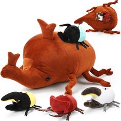 several stuffed animals sitting on top of each other