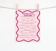 a pink sign hanging from a clothes line that says who knows the bride best?