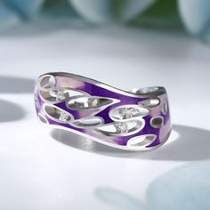 A wonderfully simple silver enamel ring that is so pretty. The silver setting and clear white stones are the perfect backgrounds for the bright violet enamel that your eye is drawn to when you look at this fabulous ring.Weight: 4.49 gMaterial: Plating Color: Silver Enamel Open Ring, Silver Open Enamel Ring, Silver Open Ring With Enamel, White Gold Enamel Ring For Anniversary, Elegant Silver Enamel Open Ring, Elegant Silver Open Enamel Ring, Silver Open Enamel Ring For Promise, Elegant Silver Enamel Ring In Sterling Silver, Silver Diamond Enamel Ring