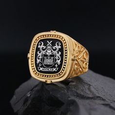 Personalized Signet Ring, Customized Ring, Coat of Arms Ring, Raised Family Celtic Ring, Crest Ring Gift, Gold Coated Family Crest Ring Gift Product Details: ✅Material: 925 Sterling Silver, Gold Coating,  Black Rhodium Coating ✅Ring Size: Available in various sizes (please refer to our sizing chart) ✅Handmade with exceptional craftsmanship ✋🎨 ✅ Dimensions:  21mm   /   ±17gr 🛡️ Discover our custom coat of arms jewelry, a symbol of heritage made uniquely yours! 🌟💍 Choose your family crest and let us bring it to life with expert craftsmanship. 🖌️✨ Our artisans create stunning pieces in silver, gold coating, or rhodium coating, tailored to your preferences. 💫🔒 With attention to detail and a touch of elegance, our jewelry collection includes signet rings, pendants, and bracelets, each de Ceremonial White Gold Rings With Polished Finish, Classic Gold Enamel Ring For Anniversary, Classic Enamel Ring With Polished Finish As A Gift, Classic Polished Enamel Ring For Gift, Classic Enamel Ring With Polished Finish, Gold Heirloom Enamel Ring For Formal Occasions, Luxury Gold Enamel Ring For Ceremonial Occasions, Gold Luxury Ceremonial Enamel Ring, Luxury Gold Ceremonial Enamel Ring