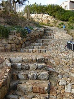 stone steps lead up to a television set