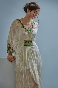 Ivory kaftan with crystal and bead embroidered floral motifs. Paired with inner. Kaftan Pattern, Kaftan Women, Baroque Floral, Kaftan For Women, Embroidered Kaftan, Kaftan Designs, Long Kaftan, Stylish Party Dresses, Boutique Dress Designs