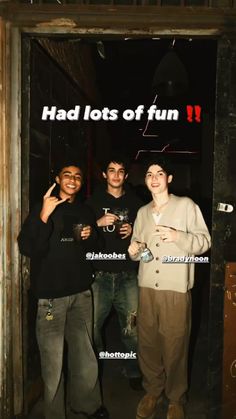 three young men standing in front of a sign that says had lots of fun 11