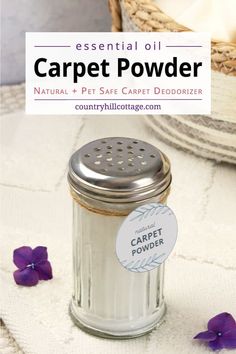 an image of a jar with some flowers on the table next to it and text that reads essential oil carpet powder natural + pet safe carpet deodizer