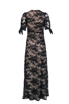 Get some dark lace in your closet today with this romantic gown from Night Cap! Made with a satin trim, this is a fitted-to-perfection frock to wear with all your favorite strappy sandals and a smudged dark lip for some gothic style that is sure to shake up any evening. Size XS 89% Polyamide, 8% Elastane, 3% Viscose V-neckline Short sheer sleeves with satin ties Lace overlay with contrasting lining Material provides stretch, no closures Waist 24" Bust 28" Total length 56" Short Sleeve Gown, Romantic Gown, Uzun Boy, Dark Lip, Black Lace Shorts, Sleeve Gown, Dark Lips, Lace Short, Night Cap