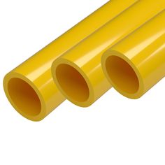 three yellow plastic pipes on a white background