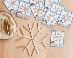 snowflakes and wooden spoons on a table