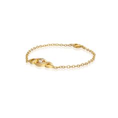 Transform your wrist with our White Teardrop Bracelet. Available in both gold and silver tones, this classic elegant piece comes in 7" or 7.5" lengths for a perfect fit. Beautiful on its own or as a traditional touch to a modern stack, embrace the adventure of effortless style. Elegant Adjustable Hypoallergenic Heart Bracelet, Elegant Hypoallergenic Adjustable Heart Bracelet, Elegant Hypoallergenic Gold Metal Bracelet, Elegant Silver Gold-plated Name Bracelet, Adjustable Yellow Gold Charm Bracelet With Oyster Design, Elegant Adjustable Gold Plated Name Bracelet, Elegant Metal Name Bracelet, Elegant Gold Hypoallergenic Heart Bracelet, Gold Infinity Jubilee Bracelet