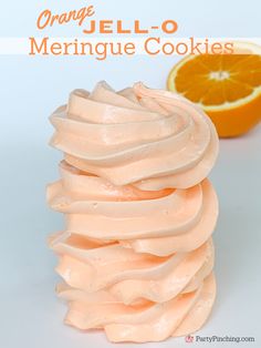 orange jell - o meringue cookies are stacked on top of each other