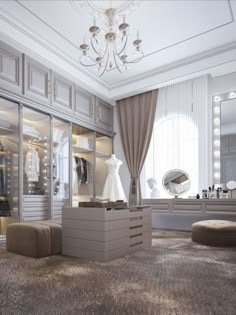 an elegant dressing room with chandelier, stools and dress on display in the window