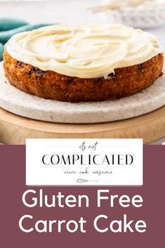 gluten free carrot cake with whipped cream frosting on a wooden platter