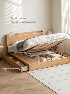 an open bed frame sitting on top of a wooden floor next to a white rug