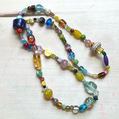 One Of A Kind Handmade Glass Bead Necklace With Vintage Y2k + 90s Beads Featuring: Vintage, Y2k/90s + Modern Beads Glass, Wood, Clay, Vinyl/Acrylic, Ceramic Curated Blend Of Small + Med-Small Beads Chunk Scale Of 1 To 5: 2.5 Fine Quality Knotted Durable High Tenacity Nylon Cord 13” Drop Length 26” Total Length Brand: Www.Karlymortensen.Com Vintage + New Materials Handmade In Denver, Colorado Ready To Ship Shop My Boutique For All Handmade Artist Items From My Studio Y2k Bead Necklace, Lamp Work Bead Jewelry, Chunky Glass Bead Necklace, Handmade Colorful Glass Beaded Necklaces, Colorful Handmade Glass Beaded Necklaces, Festival Glass Beaded Necklaces With Spacer Beads, Festival Glass Beaded Necklace With Spacer Beads, Handmade Multicolor Beaded Necklaces For Everyday, Everyday Handmade Glass Necklaces