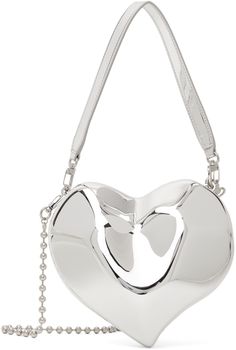 Sculptural resin bag in silver-tone. · Detachable patent faux-leather carry handle · Detachable ball-chain shoulder strap · Hinged magnetic closure · Grained faux-leather lining · Logo-engraved silver-tone hardware · H7 x W8 x D4 Supplier color: Silver Chrome Purse, Resin Bag, Silver Shoulder Bag, Strap Hinges, Silver Bag, Purse Collection, Silver Bags, My Purse, Heart Bag