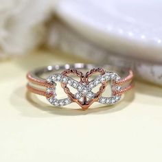 Anchor Ring In Rose Gold Silver Infinity Heart Shaped-VANCARO Elegant Rose Gold Butterfly Open Ring, Rose Gold Cubic Zirconia Butterfly Ring For Anniversary, Anniversary Rose Gold Butterfly Ring With Cubic Zirconia, Rose Gold Butterfly Promise Ring, Elegant Rose Gold Butterfly Promise Ring, Elegant Rose Gold Butterfly Ring, Rose Gold Open Butterfly Ring In Fine Jewelry Style, Rose Gold Butterfly Ring For Anniversary, Luxury Rose Gold Butterfly Ring Perfect For Gift