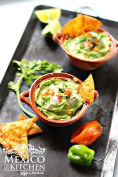 guacamole and tortilla chips on a tray