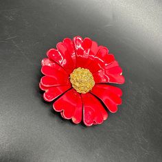 Vintage Flower Brooch Pin Enamel Metal Red Floral Statement Jewelry Retro. This is a large red flower brooch. It is metal with enamel over the top and makes quite the statement. It does have some chips and dings to the enamel throughout. Please see the picture for the full description. Red Enamel Brooch, Red Enamel Brooch Pin, Red Flower Brooches For Gift, Red Enamel Brooch Gift, Red Enamel Brooch For Gift, Red Enamel Brooches As Gift, Red Enamel Brooches For Gift, Pin Enamel, Enamel Jewelry