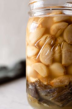 a jar filled with food sitting on top of a table