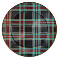 a black and green plaid plate on a white background