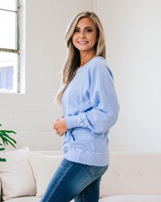 Girlfriend Crewneck Sweatshirt - Spring Blue Spring blue Crewneck Side pockets Ribbed details Good stretch Body: 100% Cotton Ribbing: 95% Cotton 5% Spandex Imported General Sizing: Small (0-4), Medium (6-8), Large (10-12), XLarge (14-16)True to sizeModel is wearing a size Small Measurements: Small: Bust: 22" // Length: 26" Medium: Bust: 22.5" // Length: 26.5" Large: Bust: 23" // Length: 27" XLarge: Bust: 23.5" // Length: 27.5" Bust measurements are taken across the chest laying flat.Length measu Fall Washed Blue Top With Ribbed Cuffs, Washed Blue Tops With Ribbed Cuffs For Fall, Fall Washed Blue Tops With Ribbed Cuffs, Blue Relaxed Fit Sweatshirt, Blue Relaxed Fit Sweater For Everyday, Blue Crew Neck Sweatshirt For Everyday, Blue Long Sleeve Sweatshirt For Everyday, Everyday Blue Sweatshirt For Spring, Spring Blue Sweatshirt