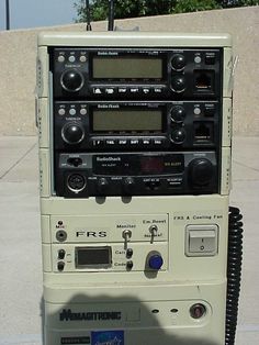 an old fashioned radio sitting on top of a parking meter