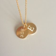 "Beautiful and charming, this double gold disc necklace is simple yet stunning. I diamond etch engrave your initial on one charm and a date on the other. Each disc charm is made from 14k gold fill and is approximately 12.5mm in diameter. A sturdy 14k gold fill chain and spring ring clasp is used. Please make sure to select your desired length in the drop down menu. In addition, please make sure to let me know what initial and date you would like to have engraved in the \"note to seller\" field u Palm Necklace, Date Necklace, Personalized Charm Necklace, Gold Disc Necklace, Engraved Engagement Ring, Keepsake Gifts, Engraved Pendant, Heart Shaped Jewelry, Monogram Ring