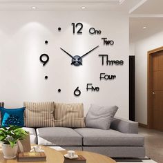 a living room filled with furniture and a large clock on the wall