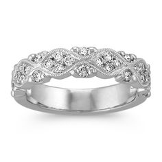 a white gold wedding band with diamonds