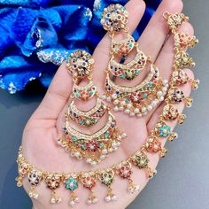 totaram jewellers navratna necklace earring sets 22k Gold Jewelry Necklaces, Wedding Jewellery Designs, Temple Jewelry Necklace, 22k Gold Jewelry, Pearl Necklace Set, 22 Carat Gold, Indian Jewelry Sets, Color Stones, Turkish Jewelry