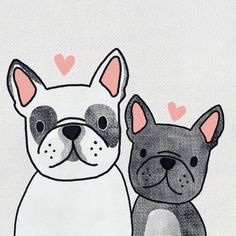 an image of two dogs with hearts on the back of their heads and one is black and white