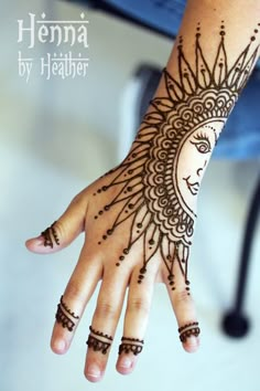 henna tattoo on the hand of a woman