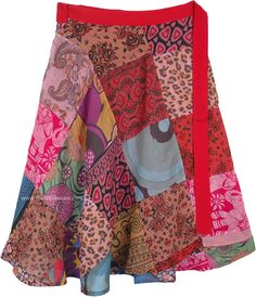 A cool summer skirt with a wrap that fits with a forever-bohemian style wrap around waist and a slight feminine flair, this is a multicolored skirt with red, orange and blue being the prominent shades.  The skirt is made up of assorted floral printed square cut patches, giving it a free-spirited gypsy look. #tlb #WrapAroundSkirt #Patchwork #JuniorPetite #Misses #Floral #Printed #Handmade Multicolor Lined Wrap Skirt, Multicolor Long Lined Wrap Skirt, Bohemian Mini Wrap Skirt For Summer, Multicolor Bohemian Wrap Skirt For Vacation, Bohemian Multicolor Wrap Skirt For Vacation, Bohemian Summer Wrap Skirt With Lining, Bohemian Summer Lined Wrap Skirt, Bohemian Wrap Skirt For Summer, Bohemian Multicolor Wrap Skirt For Beach