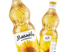 two bottles of sunflower oil on a white background