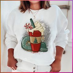 "Peppermint Mocha Sweatshirt" 🍑 Sold by: PeachySunday.com #fashion #dailyparenting #dailymotherhood Cozy Soft-washed Crew Sweater, Cozy Long Sleeve Sweater With Graphic Print, Cozy Crew Neck Sweater With Graphic Print, Comfy Soft-washed Sweater With Cozy Fit, Winter Leisure Fleece Sweater, Winter Graphic Print Sweater For Leisure, Winter Leisure Sweater With Graphic Print, Graphic Print Sweater For Leisure In Winter, Comfy Crew Neck Winter Sweater