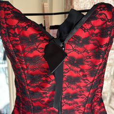 This Laces Up And Zips No Smoke Or Pets It Is Red With Black Lace It Measures From The Top To Bottom : 16.5 Red Party Corset With Built-in Bra, Red Corset With Built-in Bra For Night Out, Red Evening Corset With Boning, Red Lace Corset For Party, Red Lace Party Corset, Red Corset With Built-in Bra, Red Sleeveless Corset With Built-in Bra, Red Sleeveless Corset With Boning, Red Fitted Corset With Built-in Bra