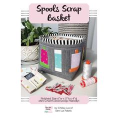 the spool's scrap basket is on display next to other crafting supplies