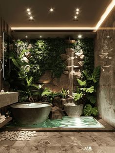 a bathroom with a large tub next to a waterfall