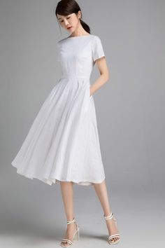 "The linen dress is the epitome of feminine chic and is sure to turn heads. DETAILS * 50% Linen + 50% cotton, soft and draply! * Cotton liner on upper part * Two side seam pockets * Short sleeve * Boat-Neck * Concealed Back zip closure. * Fit and flare dress * Below knee length * Perfect for daily casual, part or other occasion, wedding guest dress. * Wash by hand or machine with cold water * More color https://etsy.me/2YhLY2t SIZE GUIDE Size vary between Brand and Country Please get your body m Elegant A-line Linen Dress For Garden Party, A-line Midi Dress With Fitted Bodice In Linen, Fitted Bodice A-line Midi Dress In Linen, Classic Short Sleeve Midi Dress For Wedding, Elegant A-line Linen Dress With Fitted Bodice, Elegant Linen A-line Dress With Fitted Bodice, Elegant Linen Maxi Dress With Fitted Bodice, Elegant Linen Dress With Fitted Bodice, Fitted A-line Linen Wedding Dress