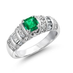 Indulge in timeless elegance with this exquisite cocktail ring, featuring a stunning emerald-shaped emerald weighing 0.75 carats. Set in luxurious 14 karat white gold, this vintage-inspired piece is adorned with sparkling baguette and round diamonds, adding a touch of sophistication and glamour to any outfit. Center Stone: Emerald-shaped emerald, 0.75 carats Setting: Vintage 14K white gold Side Stones: Baguette diamonds, approximately 0.35 carats Accent Stones: Round diamonds, approximately 0.30 carats Ring Size: 6.5 (can be resized at no extra charge) This ring is perfect for special occasions or as a unique addition to your jewelry collection. The combination of the vivid emerald and the brilliant diamonds creates a captivating contrast that will turn heads and draw compliments wherever Vintage Cocktail Ring, Gold Cocktail, Gold Cocktail Ring, 14k White Gold Ring, Garnet Rings, Brilliant Diamond, Baguette Diamond, Emerald Ring, 18k Rose Gold