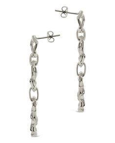 You don't want to blend in, and these bold drop earrings will help you stand out! These feature a trio of organic molten links that secure with a sturdy post back. Available in gold and silver tones. Materials: 14K gold or rhodium plated brass Features: 2" drop, 0.45" width, 0.4" stud, Lead & Nickel free, post back Modern Metal Earrings With Hook Style, Modern Metal Earrings With Hooks And Links, Modern Link Earrings With Hooks, Modern Dangle Earrings With Hook And Links, Tarnish Resistant Silver Chain Link Earrings, Modern Link Shaped Metal Earrings, Modern Sterling Silver Tarnish Resistant Linear Earrings, Modern Sterling Silver Tarnish-resistant Linear Earrings, Modern Tarnish Resistant Sterling Silver Linear Earrings