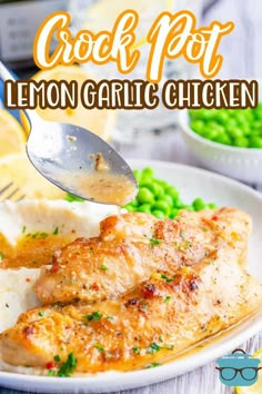 the crock pot lemon garlic chicken on a plate with peas