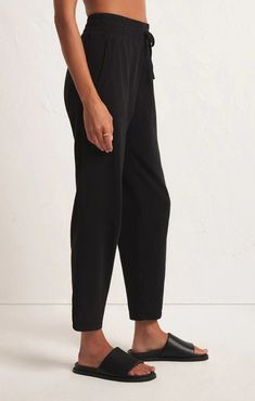 FINAL SALE: no refunds or exchanges Relaxed comfort meets effortless style with the Tuscany Pant. So easy to wear, this pull-on pant is easy to pair with your fave tops and hits at the ankle, adding some variety to your wardrobe. Product Details: Relaxed fit Premium Heavy Weight Cotton Slub: 100% Cotton Pull on elastic waist Adjustable drawcord Welt pockets Mid-weight jersey Machine Wash Cold, Hang To Dry, Warm Iron If Needed Product Measurements: Model is wearing a size Small! Denim Jogger Pants, Scandi Chic, Basic Shoes, Maxi Jumpsuit, Casual Rompers, Denim Joggers, Knit Shirt, Pull On Pants, Dress Romper