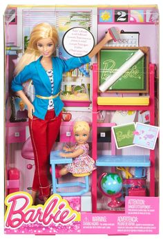 the barbie doll is standing next to her desk