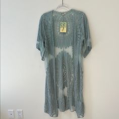 Rebellion Sz Medium Sage Green Swim Coverup Nwt! This Elegant Sage Green Lace Swim Cover-Up By Rebellion Is Perfect For The Beach Or Poolside. The Delicate Lace Adds A Touch Of Sophistication To Your Swimwear Ensemble. Whether You're Lounging By The Pool Or Taking A Stroll On The Beach, This Cover-Up Will Keep You Looking Stylish And Chic. Sz M. Measurements And Fabric Info In Pictures. One Size Open Front Top For Summer, Summer Open Front Top, Casual Lightweight Open Front Tops, Fitted Short Sleeve Cover-up For Spring, Casual Open Front Tops For Festival, Casual Fitted Open Front Cover-up, Casual Short Sleeve Cover-up For Festival, Casual Short Sleeve Festival Cover-up, Fitted Casual Cover-up For Day Out