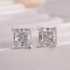 All Silver items will be shipped via standard shipping and will be delivered in 2 to 3 weeks after the shipment. All gold items will be shipped via express shipping and will be delivered in 5 to 10 days after the shipment. 7 MM Princess Cut Moissanite Diamond Stud Earrings in 14K Solid Gold, Sterling Silver Earrings, Wedding Earrings, Anniversary Gift For Her  ❖ Details For Pair  ◽ Gemstone : Moissanite ◽ Color : Colorless ◽ Clarity : VVS ◽ Stone Size :7mm Apporx.  ◽ Made to Order ◽ Gold Karat : 925 Sterling Silver, 10k / 14k / 18k Gold ◽ Available in Rose Gold, Yellow Gold, White Gold  ❖ Processing   All items in our shop are made to order, handmade, no stock with utmost care. Please allow up to 3-4 weeks for your piece to be crafted.  ❖ Rush order    You can upgrade the process time to 1 Elegant Princess Cut Earrings For Gift, Moissanite White Gold Diamond Earrings For Wedding, Elegant Princess Cut Diamond Earrings As Gift, White Gold Moissanite Diamond Earrings For Wedding, Elegant Princess Cut Diamond Earrings For Gift, Princess Cut Sterling Silver Earrings, Vvs Clarity Princess Cut Diamond Earrings For Wedding, Wedding Princess Cut Diamond Earrings With Prong Setting, Classic White Moissanite Bridal Earrings