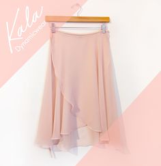 This long length wrap skirt has a subtle high-low effect. Just below the knee in the back and just above in the front, this length moves with you and has a beautiful drape. Made from lightweight polyester smooth chiffon that is quite transparent and very soft and fluid. Stretchy 1/4 inch elastic waistband and professional rolled hem finish.  Kala Dynamicwear wrap skirt size chart: XS  fits waists 23-26 inches with generous front overlap S    fits waists 27-30 inches with generous front overlap M   fits waists 31-34 inches with generous front overlap L    fits waists 35-40 inches with generous front overlap Approximate measurements in inches: Front length  XS -17       S - 18     M - 19      L - 17 Back length    XS - 21      S - 22     M  - 23    L - 24 Skirt waist edge length  XS - 35 Ballet Wrap Skirt, Garment Steamer, Beautiful Drapes, Wrinkle Remover, Rolled Hem, Womens Skirts, Peachy Pink, Wrap Skirt, Long Length