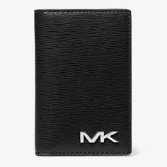 Michael Kors Cooper Bi-Fold Card Case, Black, Wallet, Card Holder Minimalism Counts In Our Cooper Card Case. Made From A Premium, Grain-Textured Material With Our Subtle Logo Hardware, This Front-Flap Accessory Includes Multiple Slots To Store Just The Essentials. Slender In Size, This Is A Grab-And-Go Favorite That Will Fit Into Your Pocket Or Briefcase With Ease. Card Case Textured Polyurethane Blend 60% Polyurethane/20% Cotton/20% Polyester 3”W X 4.48”H X 1”D Exterior Details: Back Slip Pocke Exterior Details, Grain Texture, Black Wallet, Wallet Card, Michael Kors Black, Michael Kors Bag, Card Wallet, Card Case, Black Silver