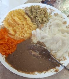 a white plate topped with different types of food