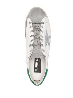 Step into effortless style with these sleek leather sneakers that mix casual and chic vibes. Ideal for dressing up a lazy day, they're like your favorite pair of jeans but for your feet. Trust us, you’ll want them in every color. Crafted from premium calf leather for a luxurious feel Features a unique star patch for a standout look Made in Italy, ensuring top-notch quality Comfortable rubber sole for all-day wear Available in a fresh Green color for a pop of personality Green Trainers, White Sneakers Men, Sneaker Games, Star Sneakers, Super Star, Leather Cap, Leather Logo, Sneaker Heels, Designer Sneakers